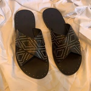 Frye black and silver boho slides.